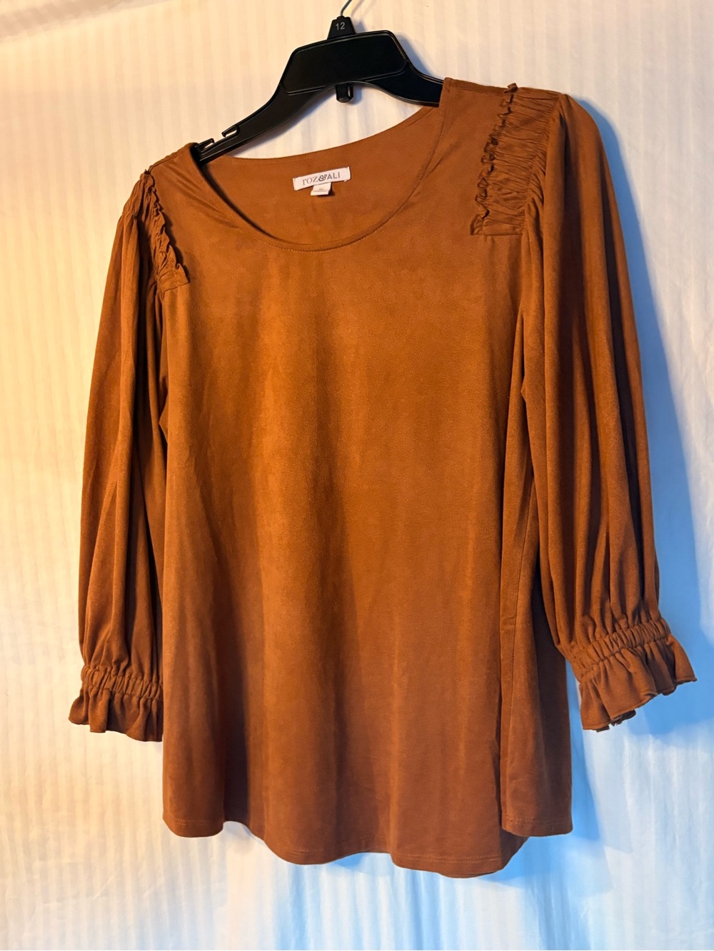 Roz & Ali Women's Rust brown long sleeve blouse with Ruffled Shoulder Detail